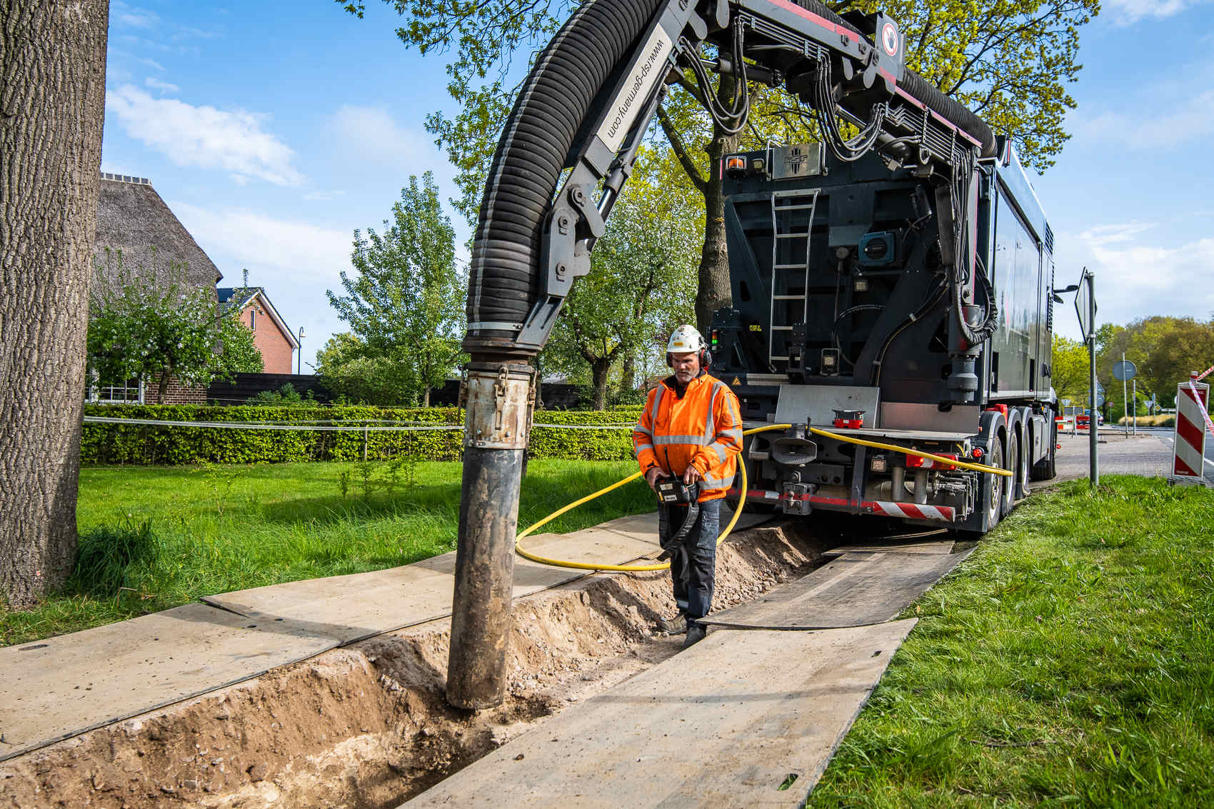 Soil removal with suction excavator